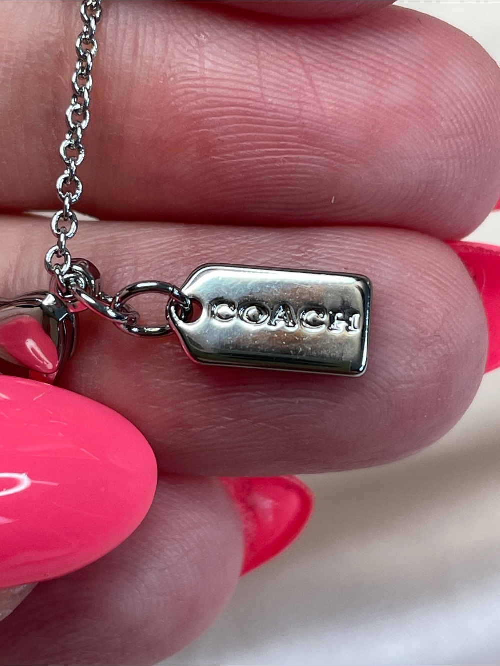 COACH Silver Necklace with Pink Enamel & Crystal Ring Charms $128 MSRP NWT - Picture 6 of 7